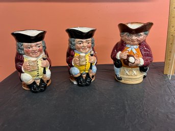 Three (3) Royal Doulton Tobys - (2) Jolly - (1) XX