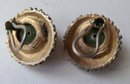 VINTAGE 'BSK' GOLDTONE CLIP ON EARRINGS WITH GREEN STONE
