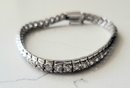 VINTAGE STERLING SILVER MARKED 925-FAS TENNIS BRACELET W/ CUBIC ZERCONIA STONS CZ