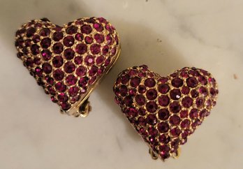 VINTAGE GOLDTONE HEART SHAPED CLIP ON EARRINGS WITH RED RHINESTONES-BELLINI EARRINGS