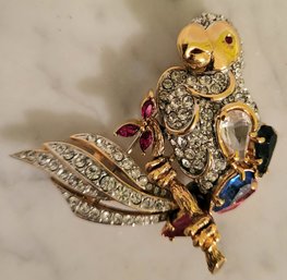 VINTAGE GOLDTONE PARROT PIN WITH MULTICOLOR HANDSET COLORED STONES AND RHNESTONES!