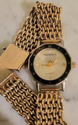 VINTAGE 12KTGF 'PENETECH' QUARTZ WATCH --7 1/2'L-HEAVY SOLID BAND WITH STRONG LOCK-