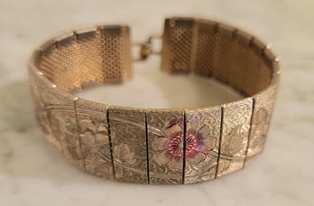 VINTAGE   VICTORIAN STYLE FLEX GOLDTONE BRACELET WITH ROSE COLOR GOLD AND ROSE  FLORAL DESIGN--6 1/2'L X 3/4'W