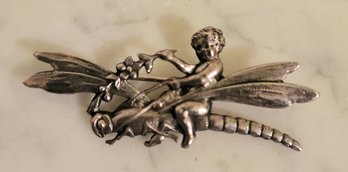 STERLING BOY RIDING GRASSHOPPER BROOCH