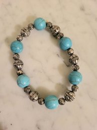 SILVERTONE BEADED BLUE STONE STRETCH BRACELET