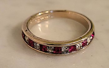 MARKED 14KTGE RING WITH RED & CLEAR CRYSTAL STONES--SIZE 7