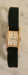 VINTAGE 18K 'OMEGA DE VILLE' WOMEN'S WATCH--RECTANGULAR DIAL-BLACK LEATHER STRAP-8'