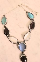 MARKED 925 STERLING NECKLACE WITH MULTI COLORED STONES--20'L