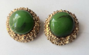VINTAGE 'BSK' GOLDTONE CLIP ON EARRINGS WITH GREEN STONE