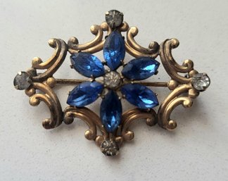 ANTIQUE VICTORIAN  'SIMMONS' GOLDTONE PIN WITH BLUE & CLEAR RHINESTONES