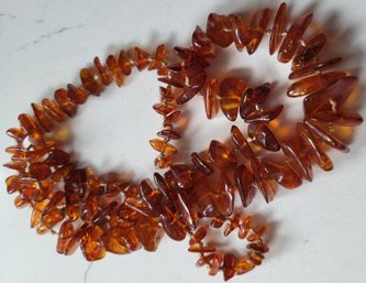VINTAGE AMBER GRADUATED ENDLESS HAND KNOTTED NECKLACE--35 Grams