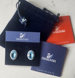 VINTAGE SILVERTONE SWAROVSKI CRYSTAL CLIP ON EARRINGS W/COA & CARE BOOKLET IN ORIGINAL PACKAGING & POUCH