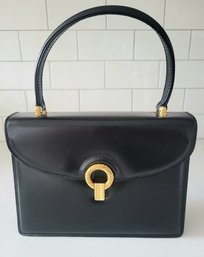 VINTAGE  SIGNED 'MADE IN ITALY BY GUCCI' BLACK WITH GOLDTONE HARDWARE HANDBAG WITH RED LINING & DUST BAG---