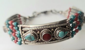 VINTAGE STERLING SILVER AFRICAN HANDCRAFTED BRACELET WITH TURQUOISE & CORAL