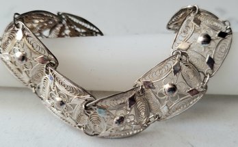 VINTAGE STERLING SILVER MARKED 925 EIGHT PANEL FILIGREE BRACELET