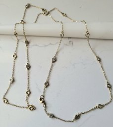 VINTAGE GOLDTONE WITH CLEAR RHINESTONES STATION NECKLACE---36'L