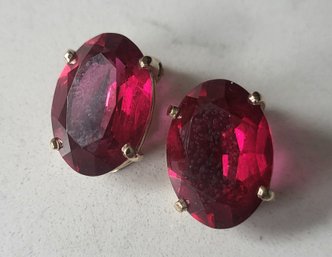 VINTAGE MARKED 'PANETTA' GOLDTONE CLIP ON EARRINGS WITH RED STONE