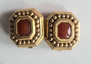 VINTAGE SIGNED 'DIVA' GOLDTONE CLIP ON EARRINGS WITH ORANGE STONE