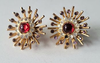 VINTAGE SIGNED 'CORO' GOLDTONE SCREW BACK EARRINGS WITH RED CENTER & CLEAR & PURPLE RHINESTONES