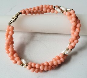 VINTAGE MARKED 14K TWISTED THREE STRAND CORAL BRACELET--7'L