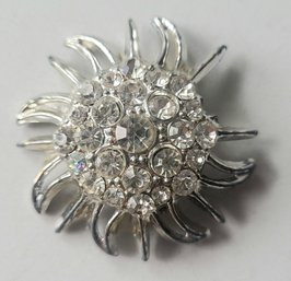 VINTAGE SILVERTONE SUNBURST BROOCH WITH RHINESTONES