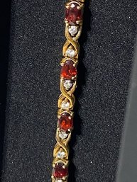Garnet And Diamond Gold Tennis Bracelet