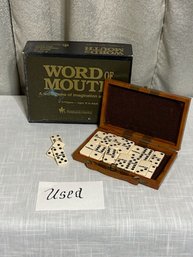 Word Of Mouth Game And Set Of Dominoes