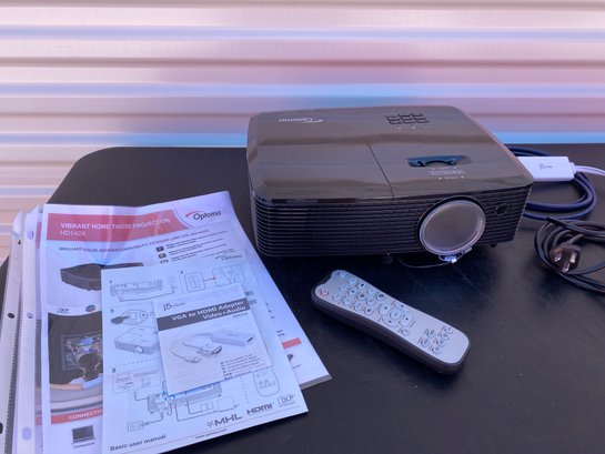 Optoma Home Theater Projector With Cords, Documentation, & Remote Control