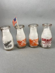 Four Vintage Half Pint Milk Bottles From Local Dairies Including Graves Dairy, Johnston's & Sullivan's Milk