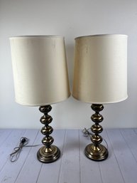 Two Bronze Colored Matching Lamps With White Shades