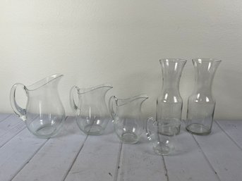 Nice Glass Tablescape Pieces- Includes A Set Of Four Pitchers And A Set Of Two Carafes