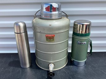 A Vintage Stanley Water Cooler & Coffee Or Soup Thermos & A Contemporary Thermos