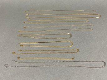 10 Gold-Tone Necklaces And Bracelet In Varying Lengths