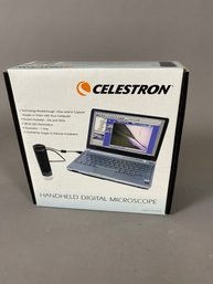 Digital Handheld Microscope By Celestron With White LED Lighting