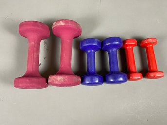 Small Set Of Rubber Or Plastic Coated Hand Weights Or Dumbells