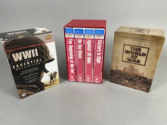 Two Boxes DVD Sets On WWII And One Boxed Set Of VHS Tapes Of The Great Battles