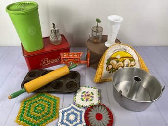 Super Fun Vintage Kitchen Items Including A Tin Bread Box, Milk Glass Vase, Wooden Rolling Pin, Food Chopper