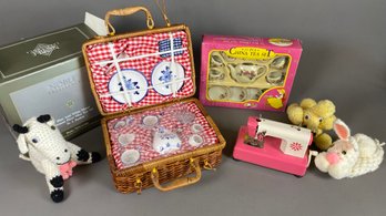 Child's Porcelain Tea Set, Picnic Set, Knitted Stuffed Animals, And Other Small Toys