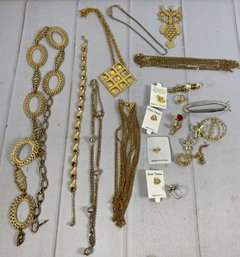 Gold Tone Costume Jewelry Including A Belt, Necklaces, And Pins
