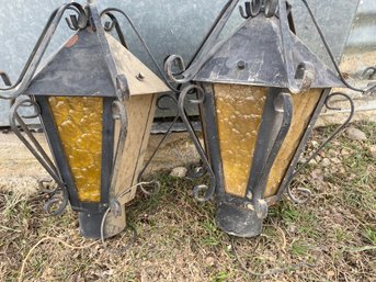 Pair Of MCM Midcentury Hardwired Outdoor Wrought Iron Lamps With Amber Glass