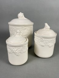 Set Of Three Ceramic Or Porcelain Canisters With Embossed Fruit Design