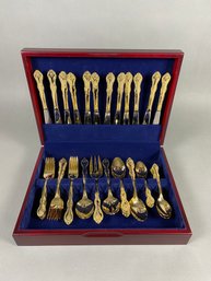 Set Of Gold Plated International Stainless Steel Flatware For Twelve In Case