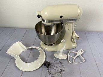 Cream Colored Tilt Head Kitchen Aid Stand Mixer With Mixing Bowl And Attachments Model K45KK