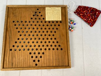 Wooden Vintage Star Checkers Marble Game Board With Several Marbles