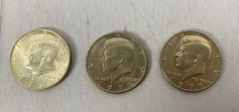 Three Kennedy Half Dollars Dated 1968, 1972, 1977 Denver Mint Mark