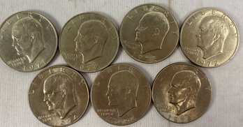 Seven Eisenhower Silver Dollars With Dates Of 1971, 1972, 1974, 1976, 1978, D And P Mint Mark