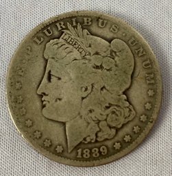 One US 1889 Morgan Head Eagle Silver Dollar Coin, Circulated, Ungraded, O Mint Mark