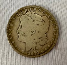 One US 1879 Morgan Head Eagle Silver Dollar Coin, Circulated, Ungraded, No Mint Mark