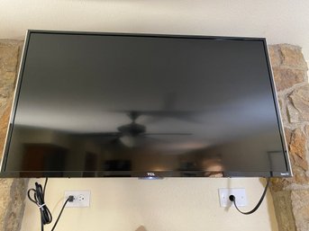 Nice Wall Mounted TLC Roku Smart Television With Remote, Working