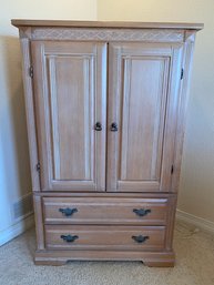 Solid Wood Armoire With A White Wash Finish And Storage Drawers